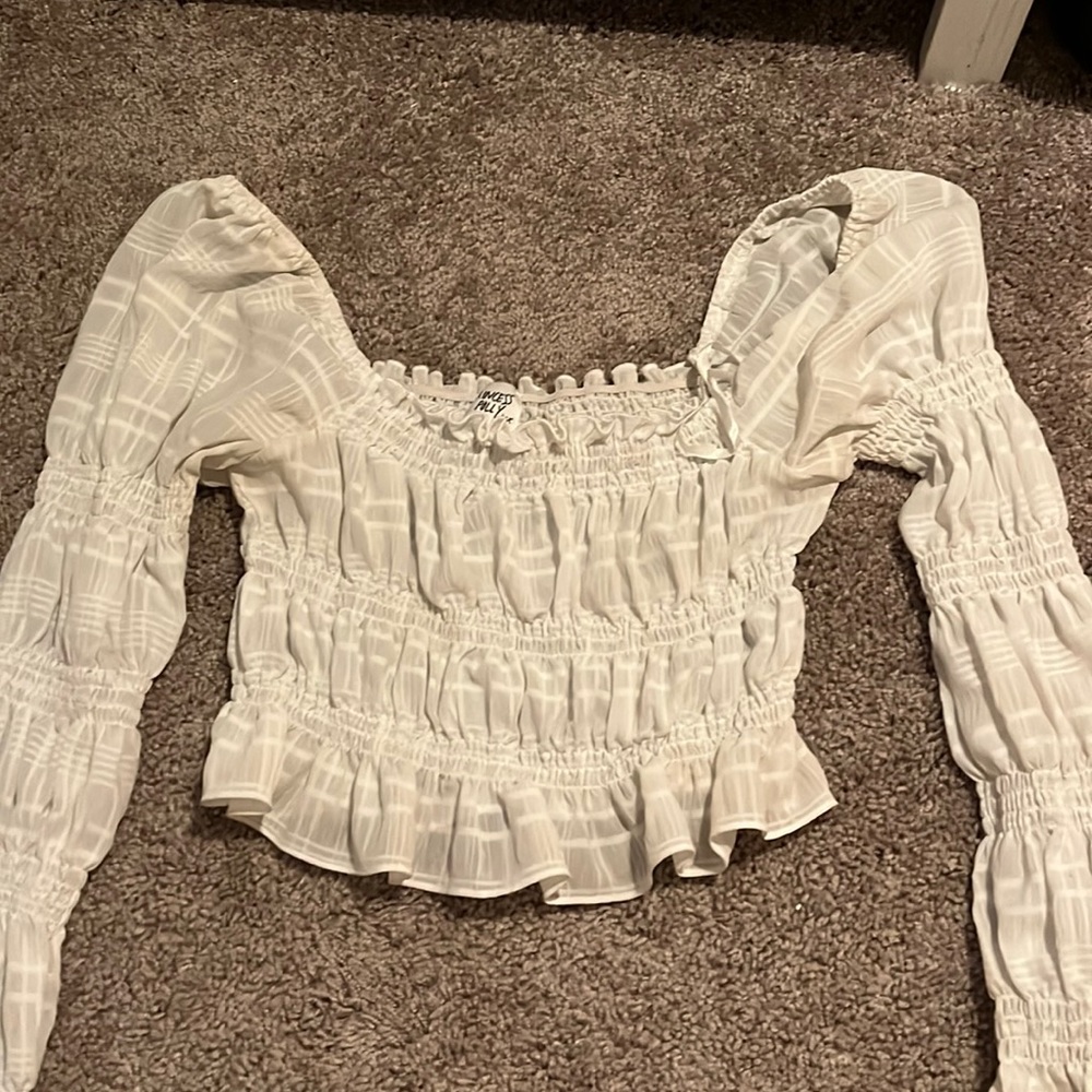 white long sleeve top with bell bottom sleeves!